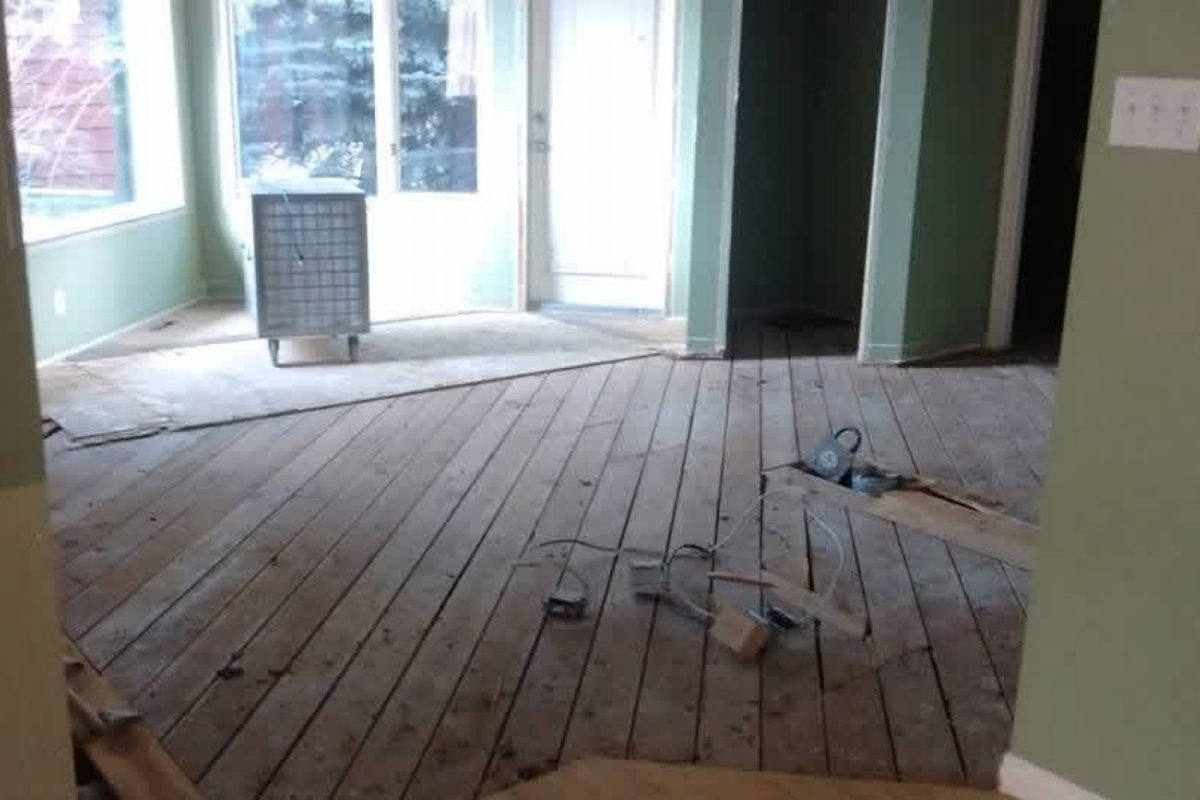 Wet removal of asbestos-containing material inside containment